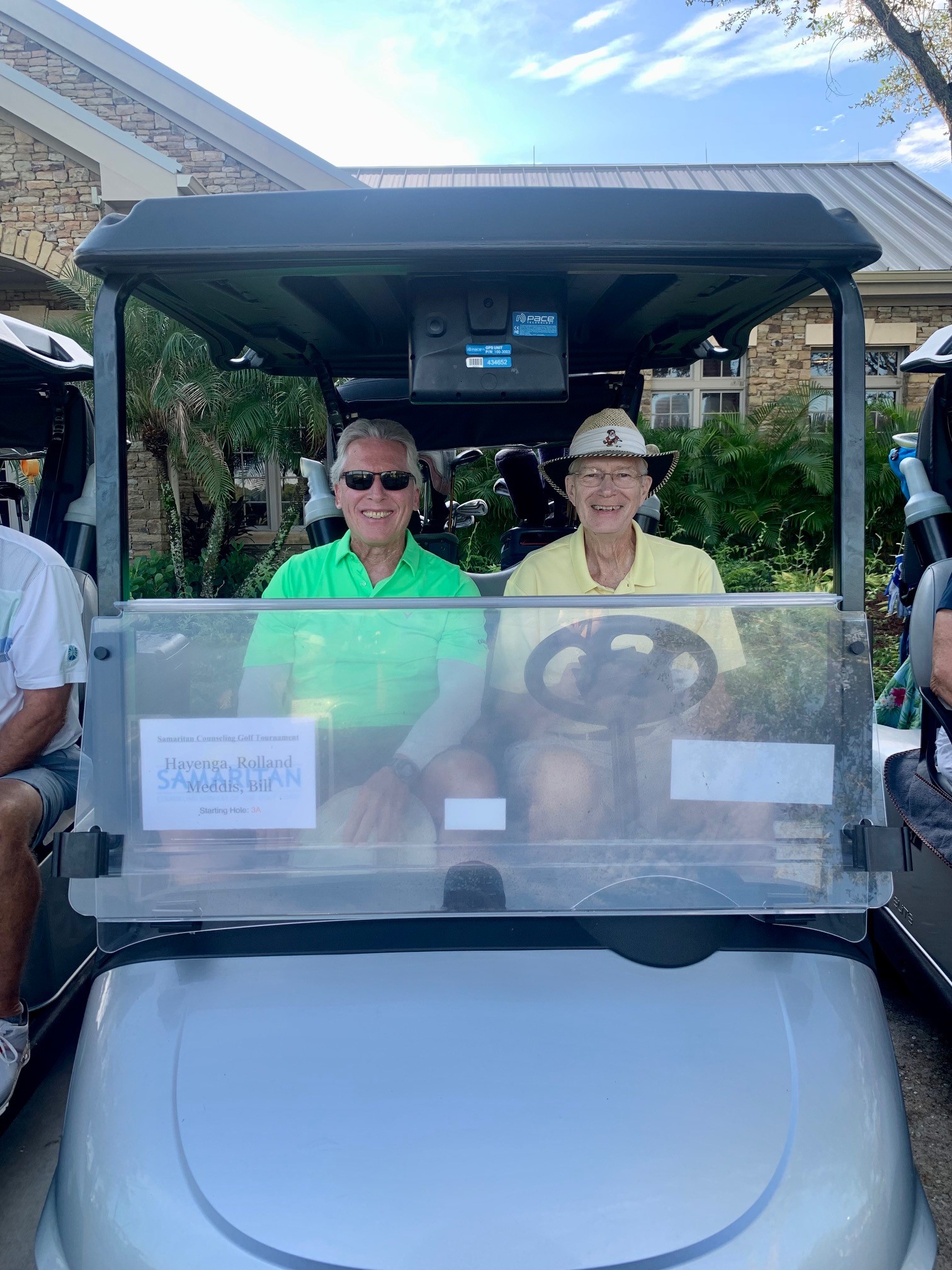 Golfers in Cart